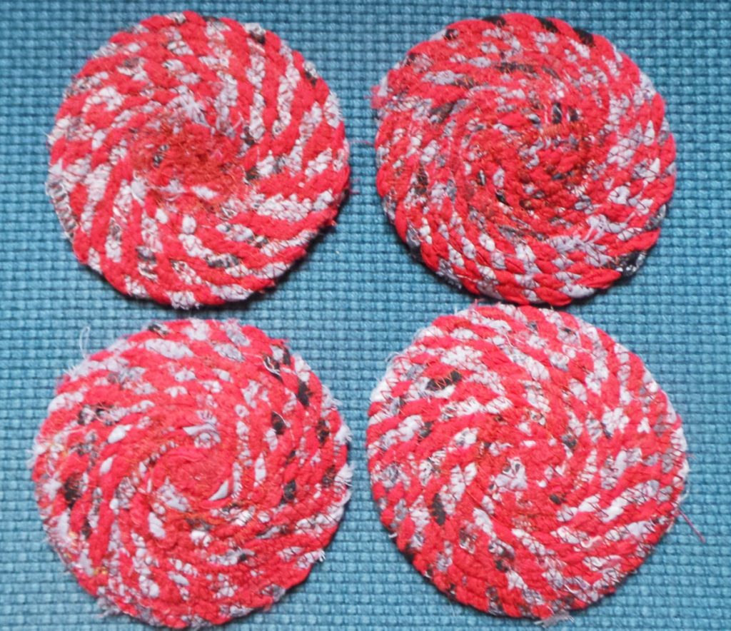 I added red fabric to make these coasters nicer