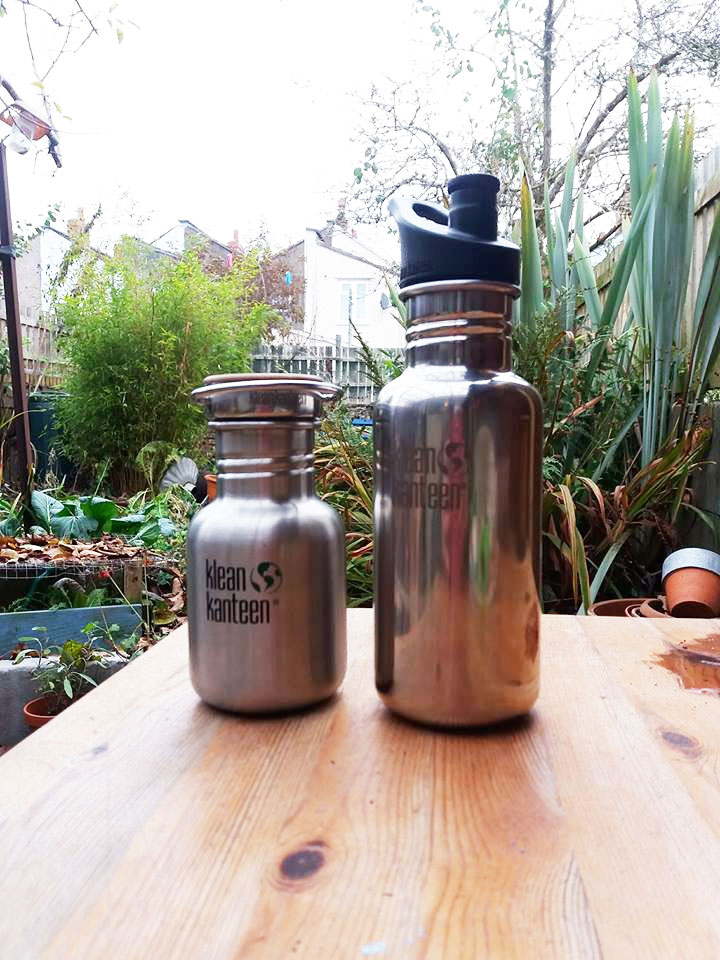 Reausable bottles in the less stuff garden